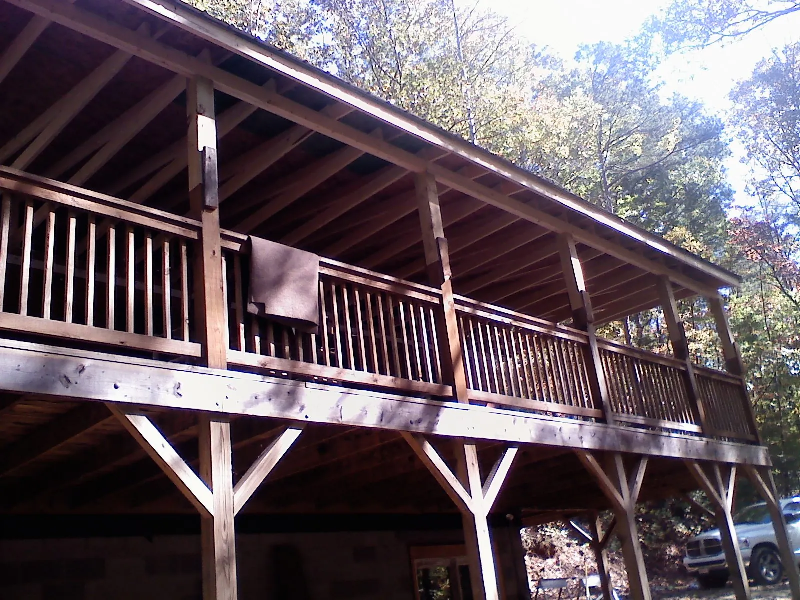 Timber framing under a new elevated porch and deck — Roof Leak Repair in Orwell by Roofing Brothers